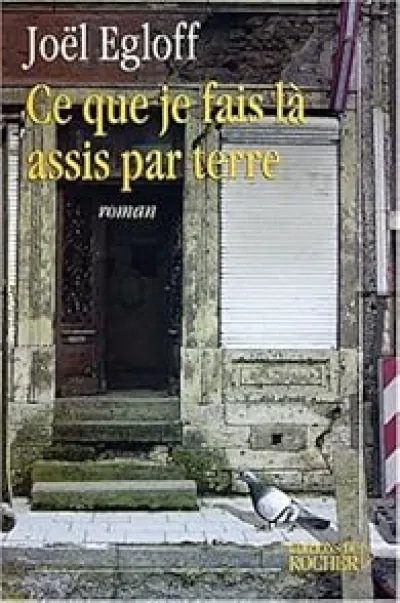 Ce que je fais là, assis par terre